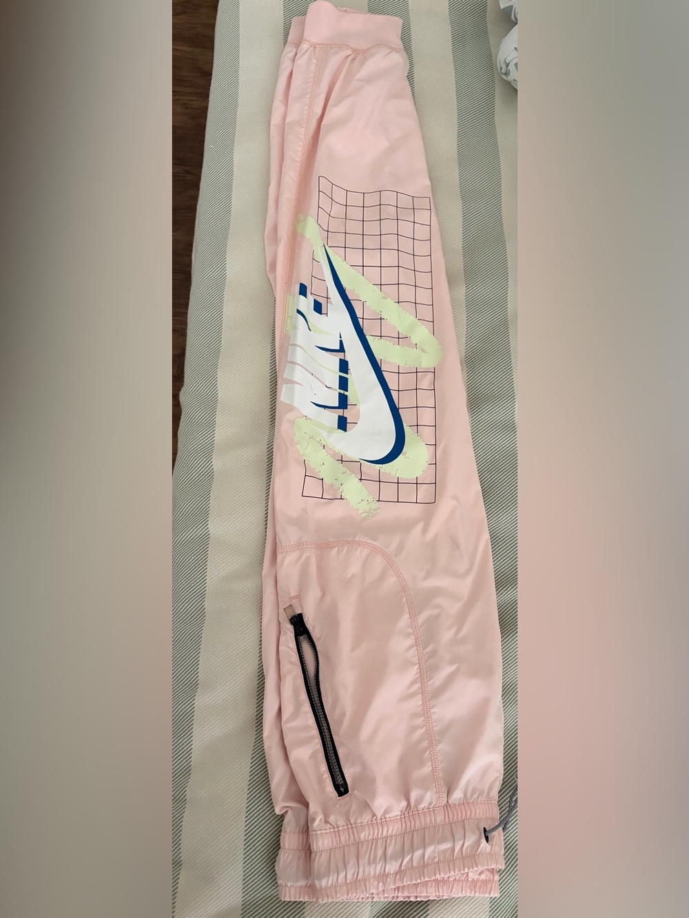Nike Pale Pink joggers with White Swoosh